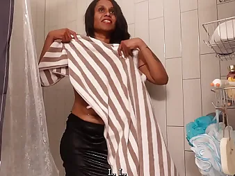 Undressed Indian maid cleans the toilet and shower